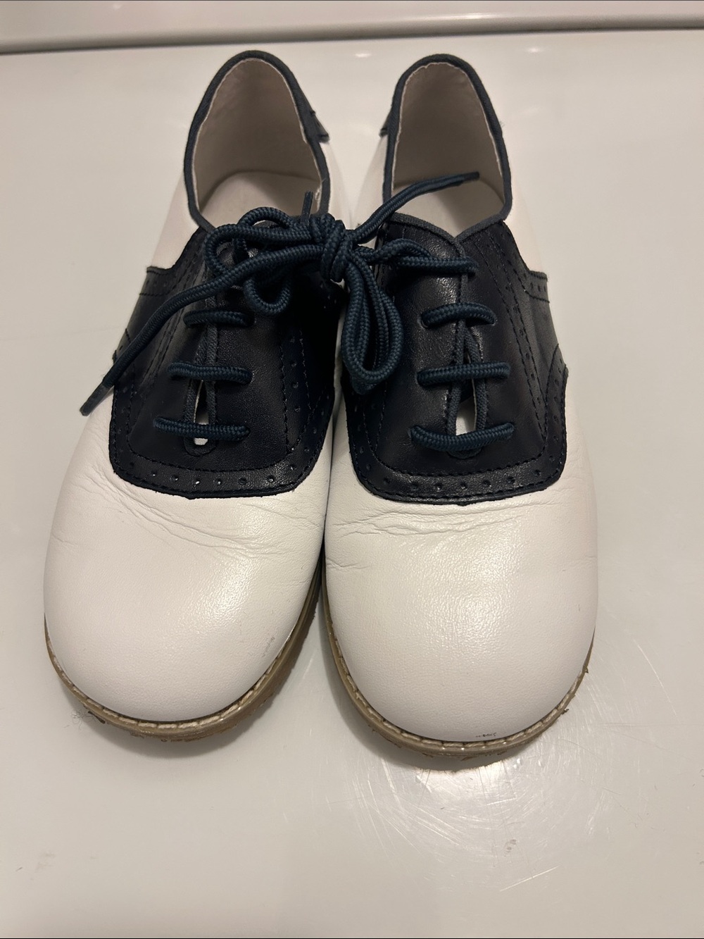 EUC Kiss Lamour navy blue and white saddle oxfords size 2